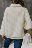LOOSE-FITTING SOLID COLOR TEXTURED SWEATSHIRT
